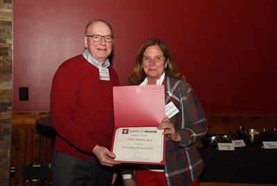 Dean Jay Hess and Colleen Madden with award