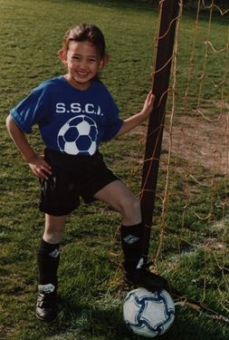 Ryley Bugay as a child playing soccer