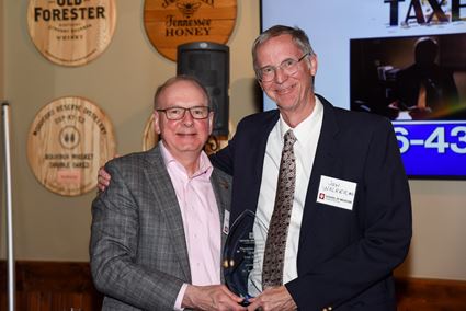 Dean Jay Hess and Dr. Jon Walker with award